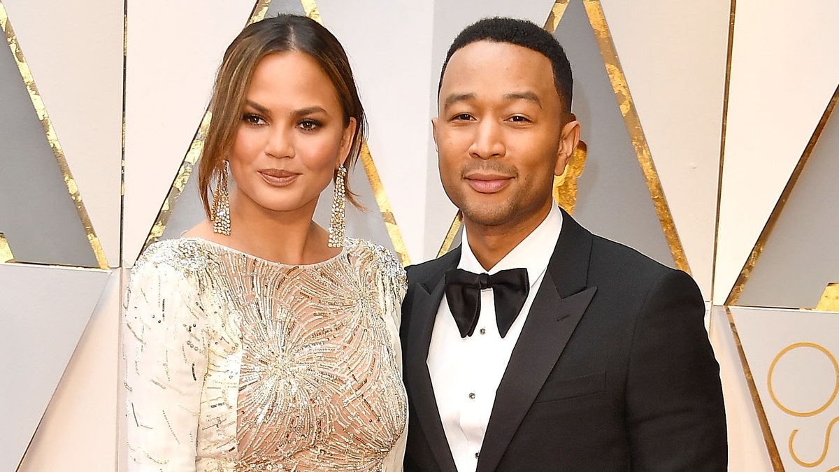 Chrissy Teigen and John Legend celebrated Biden's projected victory by dancing to 'FDT,' an anti-Trump protest song. (Photo by Steve Granitz/WireImage)