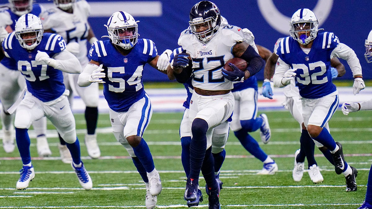 Tennessee Titans running back Derrick Henry (22) runs against the Tennessee Titans in the first half of an NFL football game in Indianapolis, Sunday, Nov. 29, 2020. (AP Photo/AJ Mast)