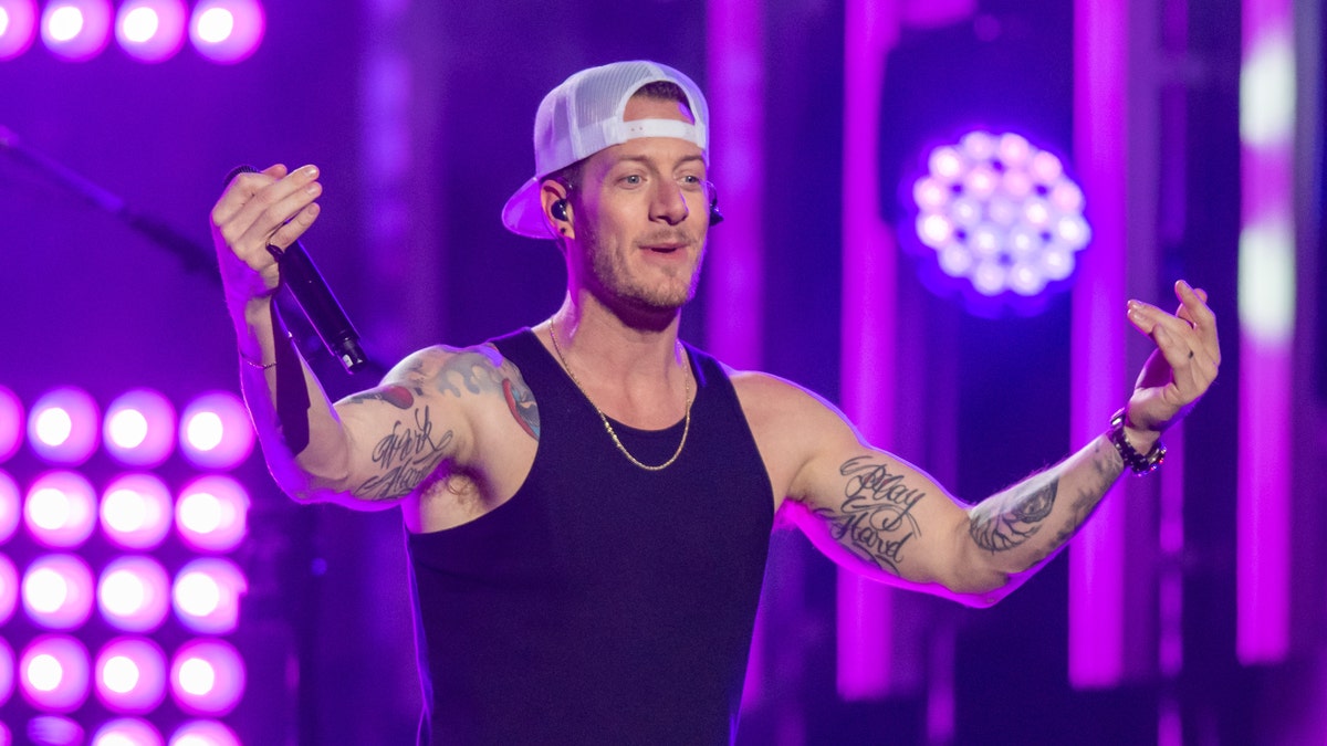 Tyler Hubbard is quarantining on his tour bus outside his house. 