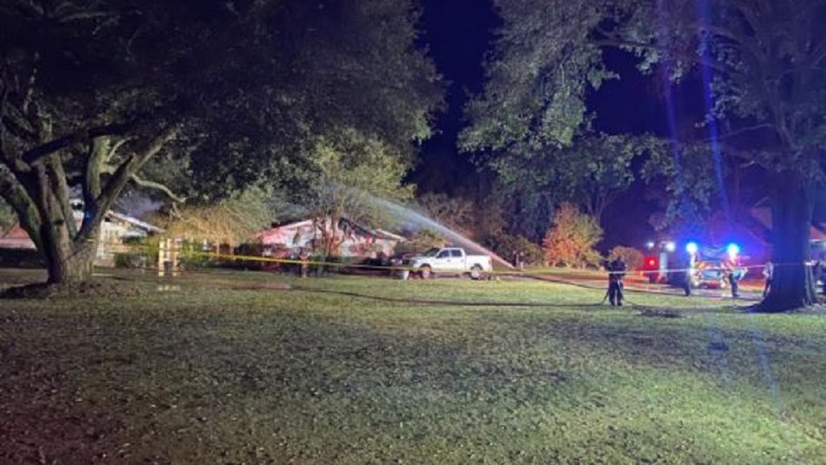 A home nurse died Monday trying to save her 71-year-old paraplegic patient from a fire.