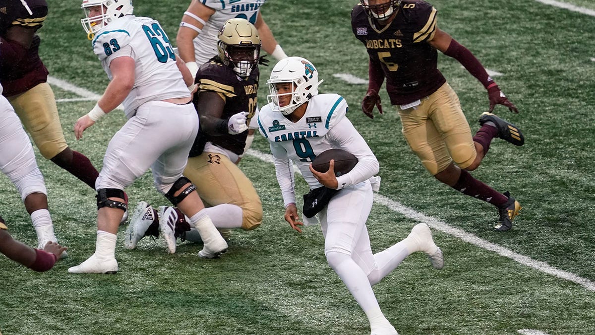 Coastal Carolina's Fred Payton (9) runs against Texas State during the second half of an NCAA college football game in San Marcos, Texas, Saturday, Nov. 28, 2020. (AP Photo/Chuck Burton)