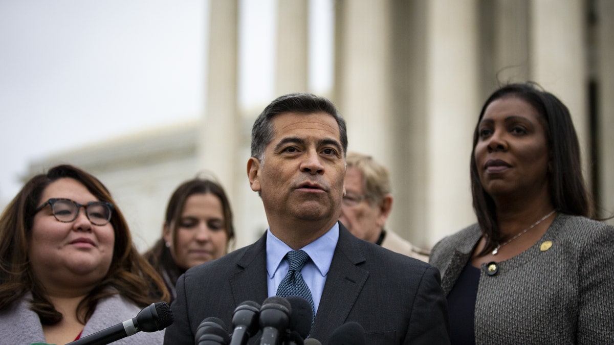 Xavier Becerra, California's attorney general, center, speaks during a news conference outside the Supreme Court in Washington, D.C., U.S., on Tuesday, Nov. 12, 2019. Photographer: Al Drago/Bloomberg via Getty Images