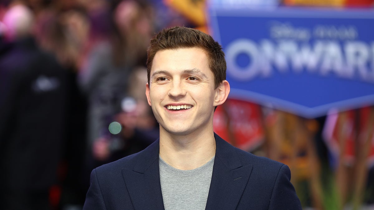 Actor Tom Holland is reminding fans to wear their PPE amid the coronavirus pandemic. (Photo by Tim P. Whitby/Getty Images)