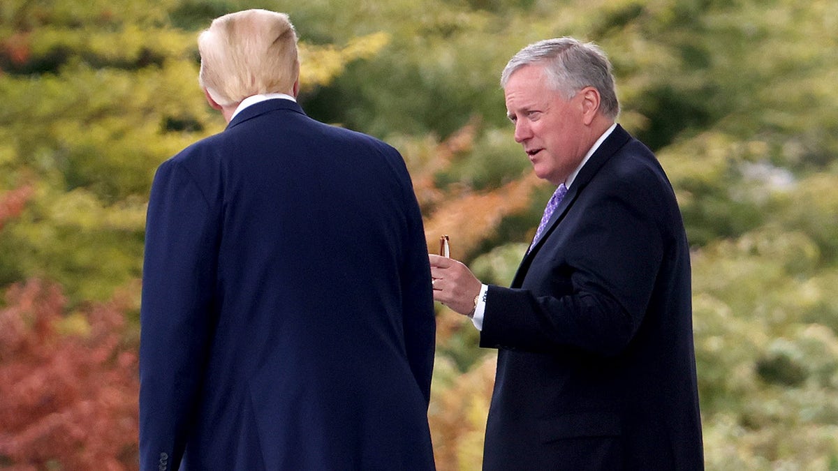 President Donald Trump confers with White House Chief of Staff Mark Meadows while departing the White House September 1, 2020 in Washington,  (Photo by Win McNamee/Getty Images)