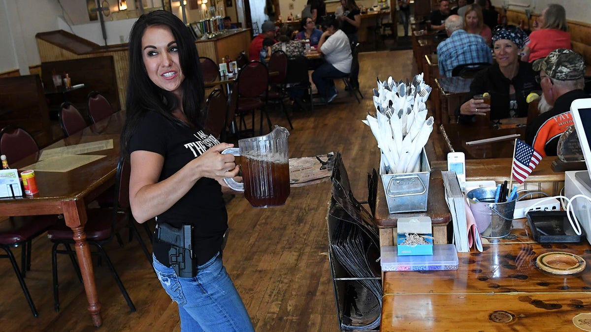 RIFLE, CO - MAY 29: Lauren Boebert, owner of the Shooters Grill, has gained national attention for her decision to encourage her staff to carry a firearm during work on May 29, 2018 in Rifle, Colorado. (Photo by RJ Sangosti/The Denver Post via Getty Images)