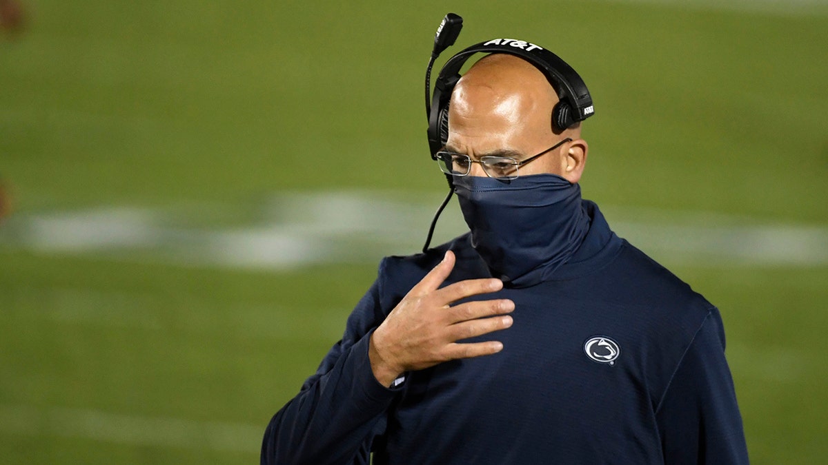 Penn State head coach James Franklin walks along the sideline late in the fourth quarter of an NCAA college football game against Maryland in State College, Pa., Saturday, Nov. 7, 2020. (AP Photo/Barry Reeger)