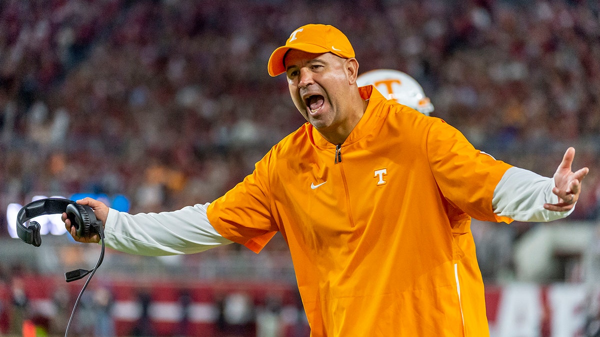 FILE - In this Oct. 19, 2019, file photo, Tennessee head coach Jeremy Pruitt yells at the officials during an NCAA college football game against Alabama in Tuscaloosa, Ala. (AP Photo/Vasha Hunt, File)