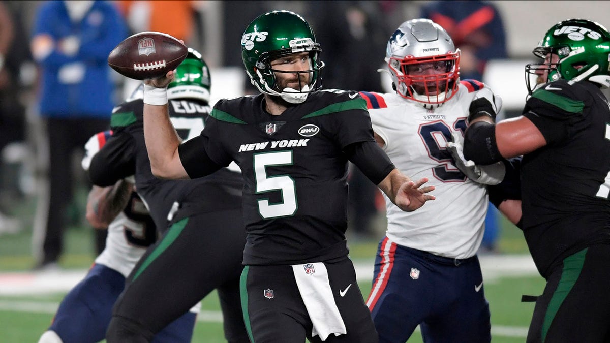 New York Jets quarterback Joe Flacco throws during the first half of an NFL football game against the New England Patriots, Monday, Nov. 9, 2020, in East Rutherford, N.J. (AP Photo/Bill Kostroun)