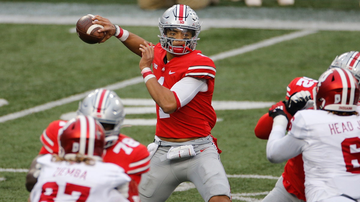 Ohio State quarterback Justin Fields throws a pass against Indiana during the first half of an NCAA college football game Saturday, Nov. 21, 2020, in Columbus, Ohio. (Associated Press)