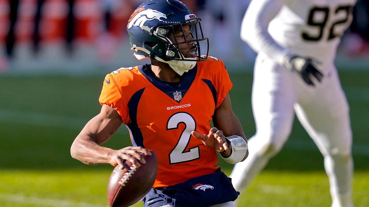 Denver Broncos quarterback Kendall Hinton (2) looks to throw against the New Orleans Saints during the first half of an NFL football game, Sunday, Nov. 29, 2020, in Denver. (AP Photo/David Zalubowski)