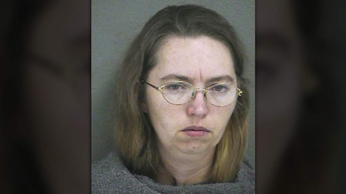 In this handout photo provided by the Wyandotte County Sheriff's Department, Lisa Montgomery appears in a booking photo released Dec. 20, 2004 in Kansas City, Kansas. Montgomery, of Melvern, Kansas, is accused of murdering the pregnant Bobbie Jo Stinnett, cutting the fetus from her body, and claiming the live baby as her own. (Photo by Wyandotte County Sheriff's Department via Getty Images)