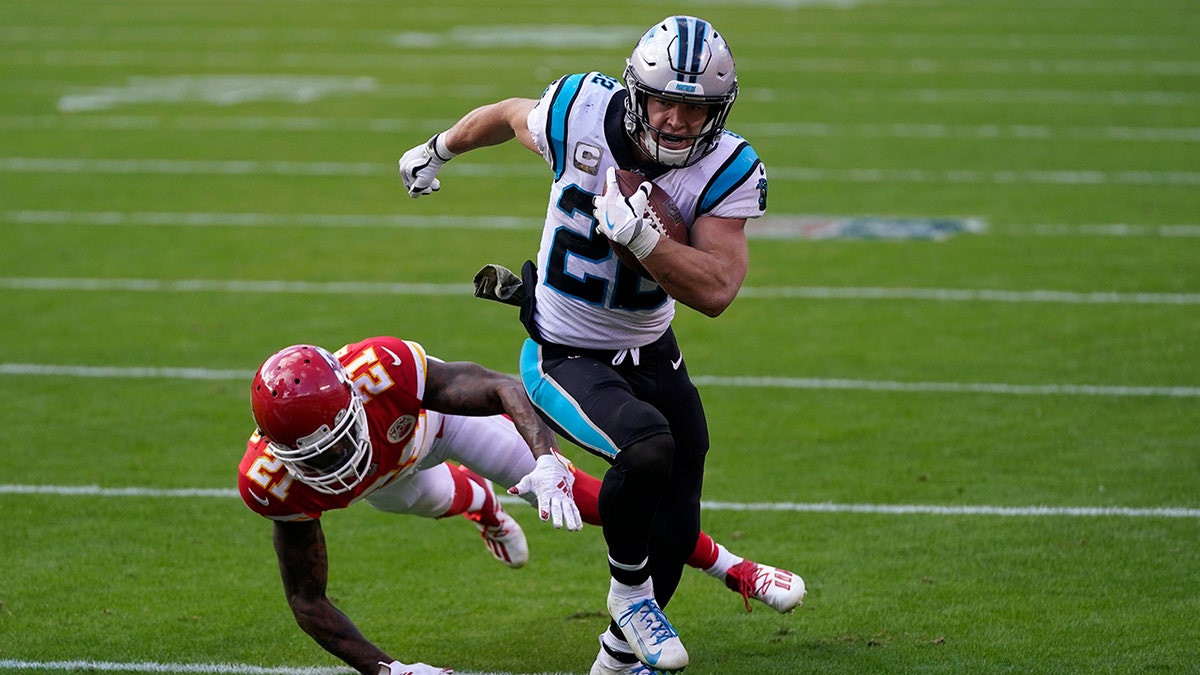 Christian McCaffrey eludes tackle