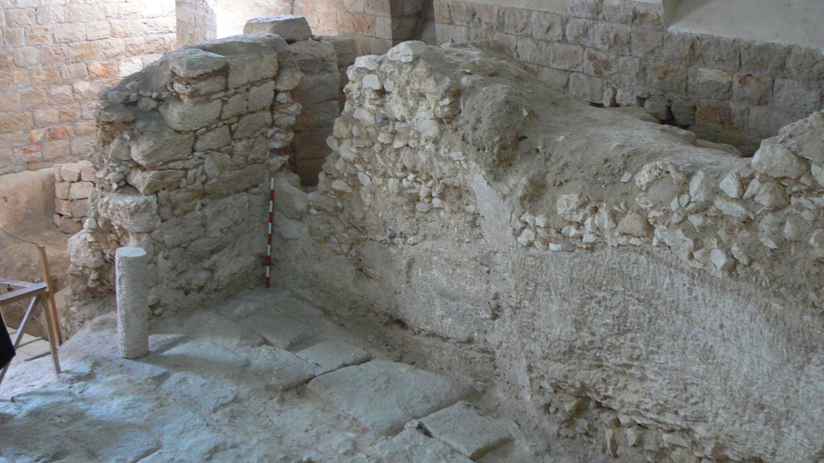 The first-century A.D. house showing one of its rock-cut walls.