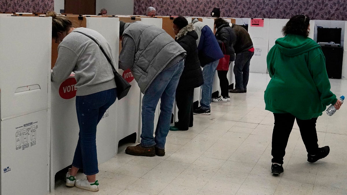 Voters fill out their ballots once inside the polling place at the Oklahoma County Election Board, Thursday, Oct. 29, 2020, in Oklahoma City.