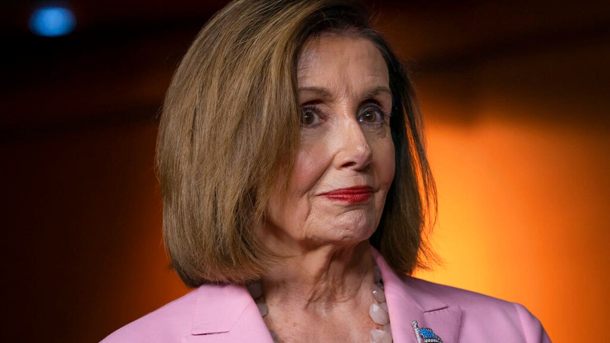 FILE: Speaker of the House Nancy Pelosi, D-Calif., leads other House Democrats to discuss H.R. 1, the For the People Act, which passed in the House but is being held up in the Senate, at the Capitol in Washington, Friday, Sept. 27, 2019. (AP Photo/J. Scott Applewhite)