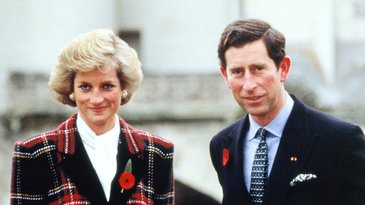Charles and Diana, Prince and Princess of Wales, pose outside Chateau de Chambord during their official visit to France on November 9, 1988 in Chambord, France. 
