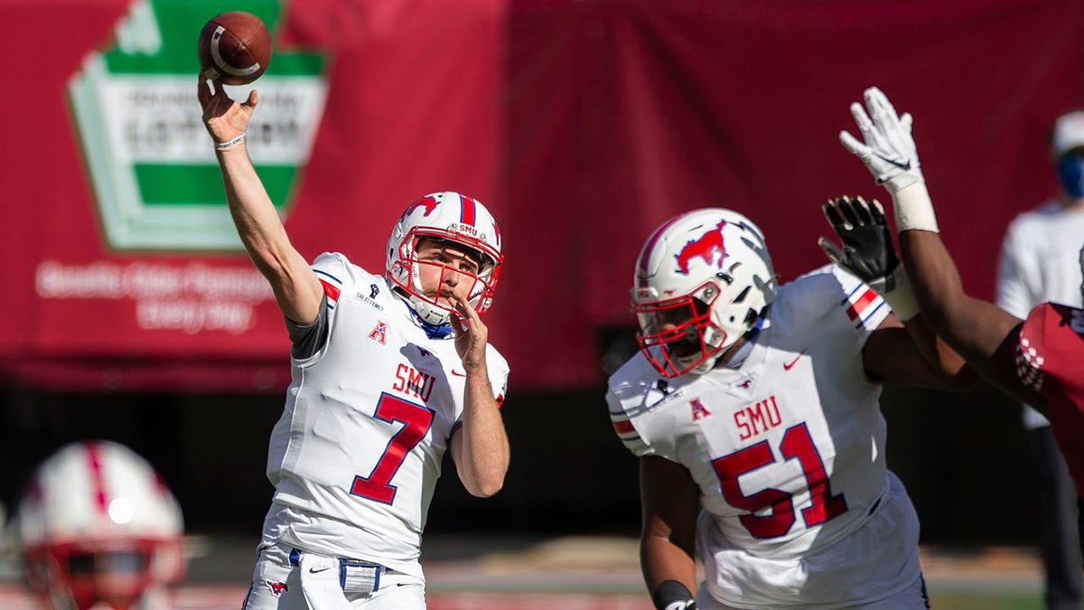 SMU quarterback Shane Buechele (7) throws during the first half of an NCAA college football game against Temple, Saturday, Nov. 7, 2020, in Philadelphia. (AP Photo/Laurence Kesterson)