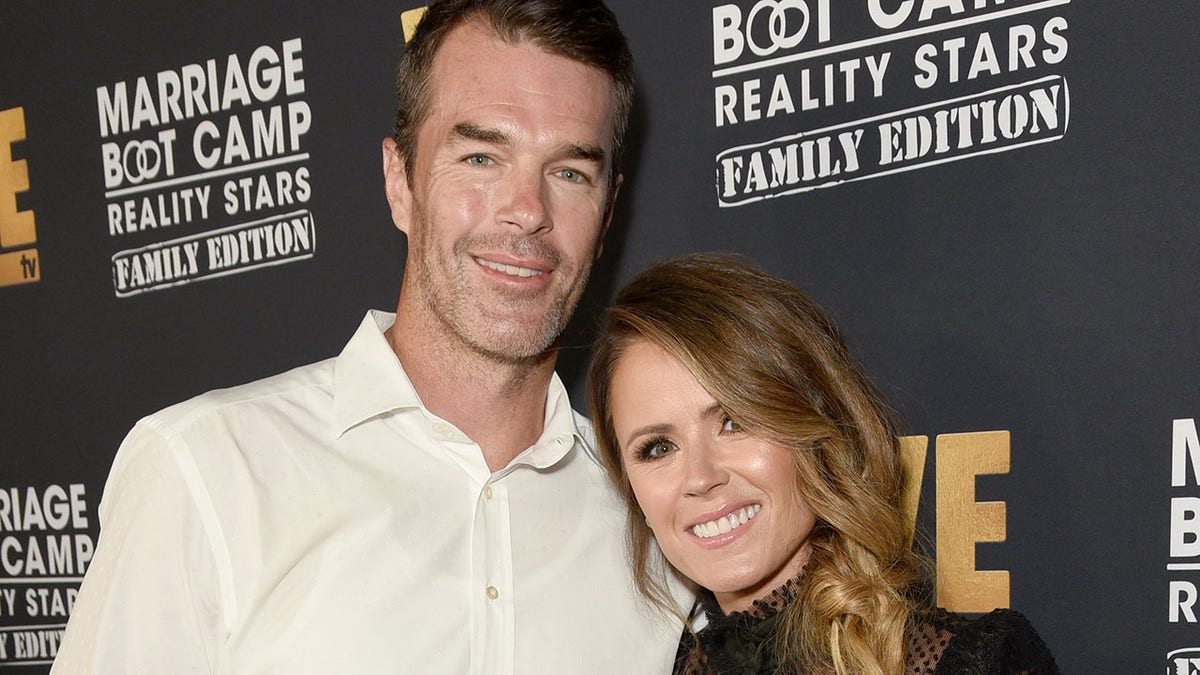 Trista Sutter (right) says that her husband Ryan (left) is suffering from a mystery illness. (Photo by Presley Ann/Getty Images for WE tv )