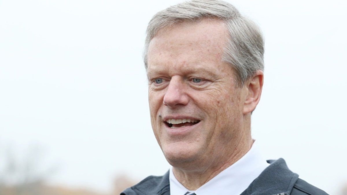 Charlie Baker outside a polling location