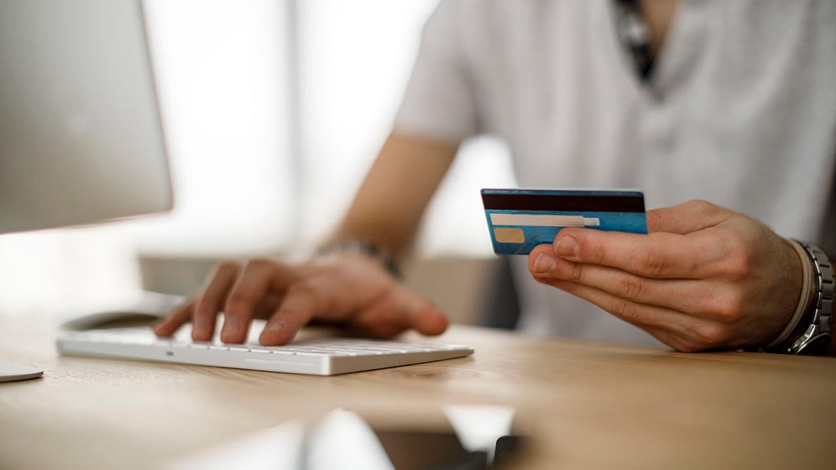 Person using a credit card