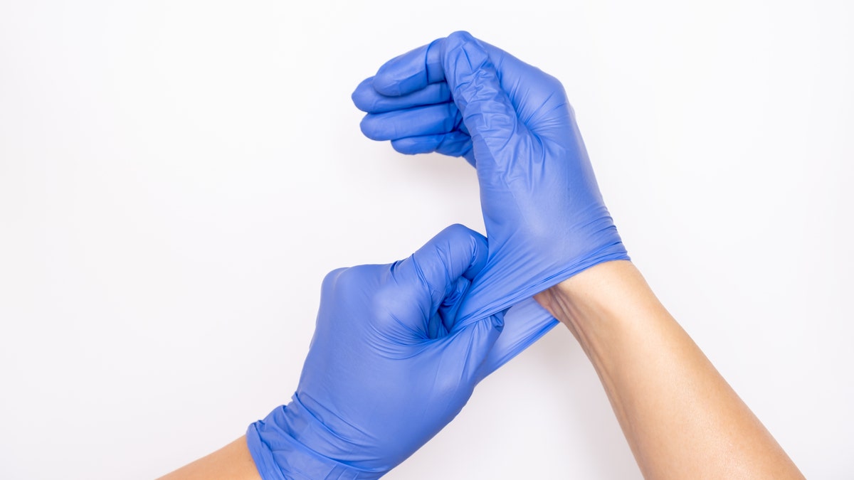 The world’s largest maker of surgical gloves is temporarily closing more than half its factories despite record demand — because more than 1,000 employees tested positive for the coronavirus, authorities said Monday. (iStock)