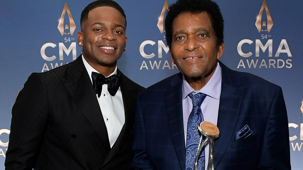 Jimmie Allen and Charley Pride at the 2020 CMA Awards. (Photo by Jason Kempin/Getty Images for CMA)