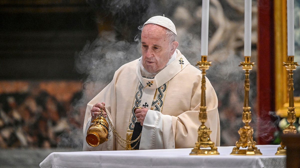 Pope Francis incenses the altar as he celebrates Mass on the occasion of the Christ the King festivity, in St. Peter's Basilica at the Vatican on Sunday. (Vincenzo Pinto/Pool Photo via AP, File)