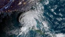 Eta weakens to tropical storm as it takes aim at Florida's west coast