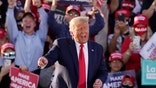 President Donald Trump works the crowd after speaking at a campaign rally Monday, Oct. 19, 2020, in Tucson, Ariz. (AP Photo/Ross D. Franklin)