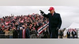 President Donald Trump arrives for a campaign rally at Michigan Sports Stars Park, Sunday, Nov. 1, 2020, in Washington, Mich. (AP Photo/Evan Vucci)