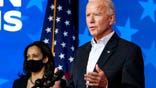 Democratic presidential candidate former Vice President Joe Biden speaks Thursday, Nov. 5, 2020, in Wilmington, Del. Democratic vice presidential candidate Sen. Kamala Harris, D-Calif., stands at left. (AP Photo/Carolyn Kaster)