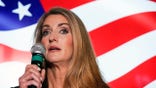 Republican candidate for U.S. Senate Sen. Kelly Loeffler speaks at a campaign rally on Friday, Nov. 13, 2020, in Cumming, Ga. Loeffler and Democratic candidate Raphael Warnock are in a runoff election for the Senate seat in Georgia. (AP Photo/Brynn Anderson)