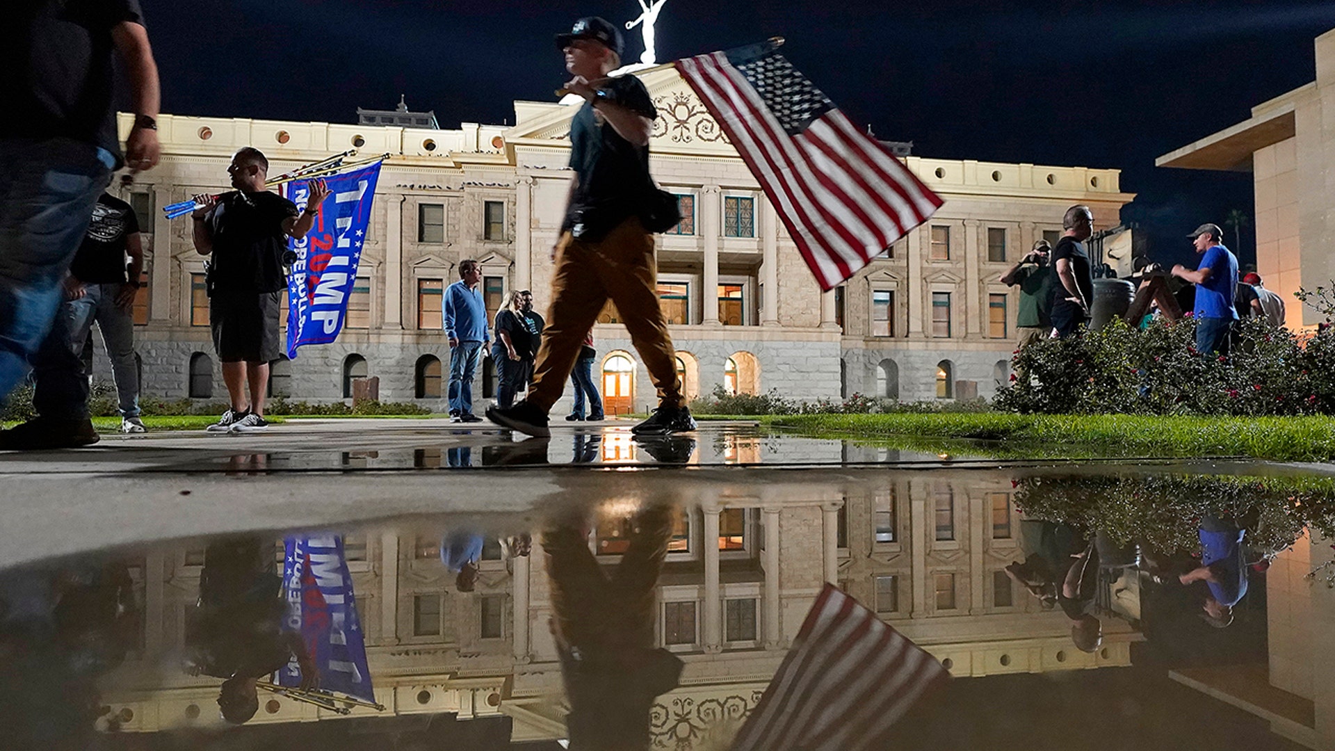 President Trump supporters gather for a voters rights rally, Wednesday, Nov. 4, 2020, at the Capitol in Phoenix.