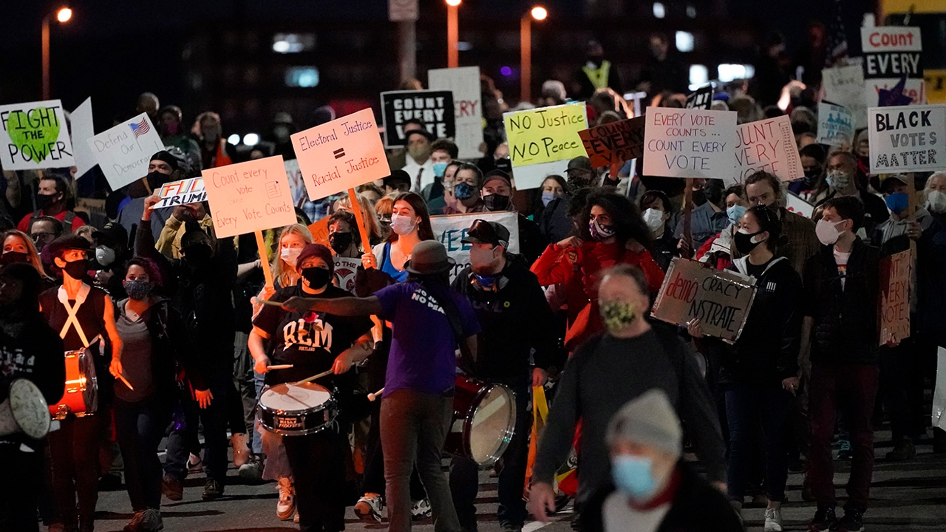 Protesters march in Portland, Ore., Wednesday, Nov. 4, 2020, following Tuesday's election.