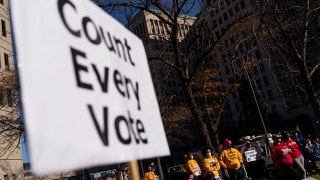 Detroit mail-in vote count moved away from room with windows after 2020