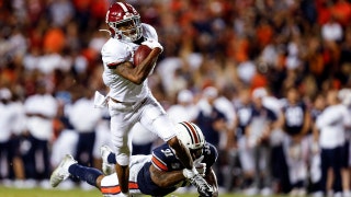 Smith, No. 1 Alabama rout short-handed Kentucky, 63-3