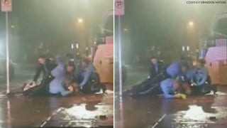 Video of Michigan police struggle goes viral as suspect cries out 'I can't breathe;' officer put on leave