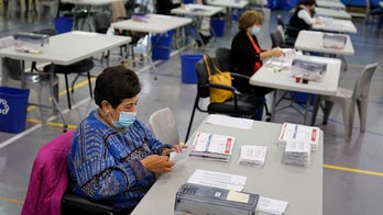 Coronavirus face masks at polls encouraged, but not required in some states