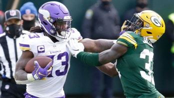 Cook's 4 TDs help Vikings knock off Packers 28-22