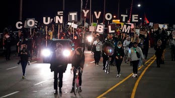 Live Updates: Activists march in US cities after Election Day; Oregon National Guard activated