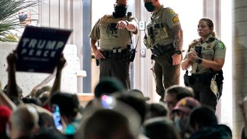Trump supporters protest at Arizona voting center while ballots are tallied