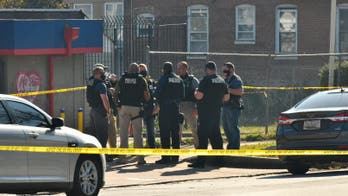 Baltimore police shot at while sitting in unmarked surveillance vehicle; suspect fatally wounded: officials