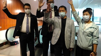 Hong Kong pro-democracy legislators hand in resignations