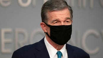 North Carolina Democratic governor issues new coronavirus rule: Wear a mask at home if you have guests over