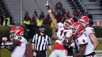 No. 13 Georgia runs all over South Carolina in 45-16 victory