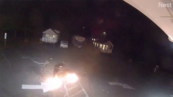 Video shows man torching NC business and getting away with his feet on fire