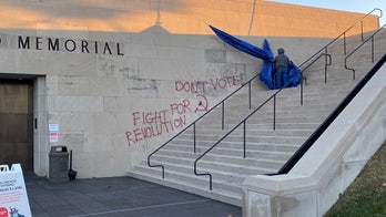 Election Day anti-voting message spray-painted on Kansas City's World War I Museum