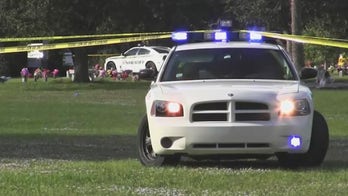 Mother of slain Florida teen shot at his burial service, officials say