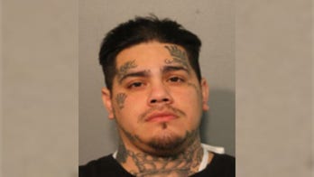 Man charged with firing shots at a Chicago police officer