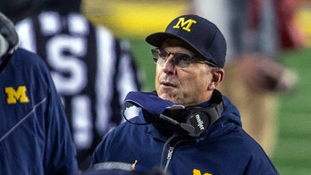 Jim Harbaugh scrutinized as Michigan goes behind early against Rutgers